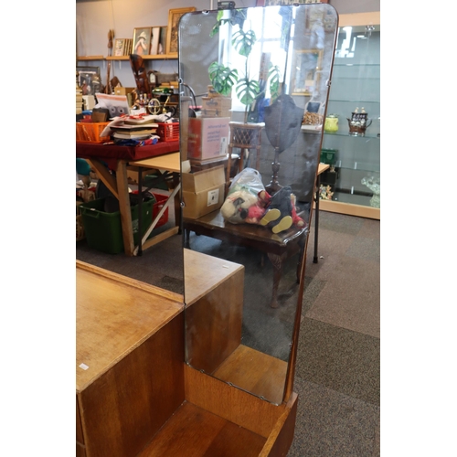 688 - A Mid century dressing table/wardrobe unit with sliding wardrobe door and four drawers with mirror a... 