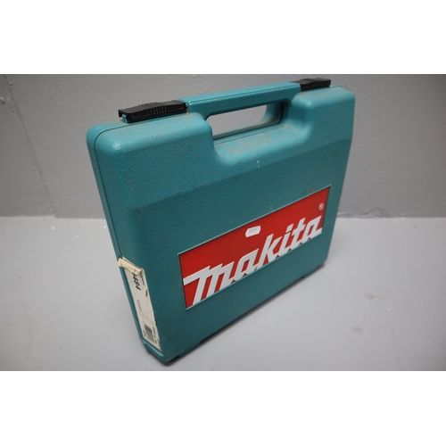 759 - Makita 650 watt corded hammer drill with case working when tested