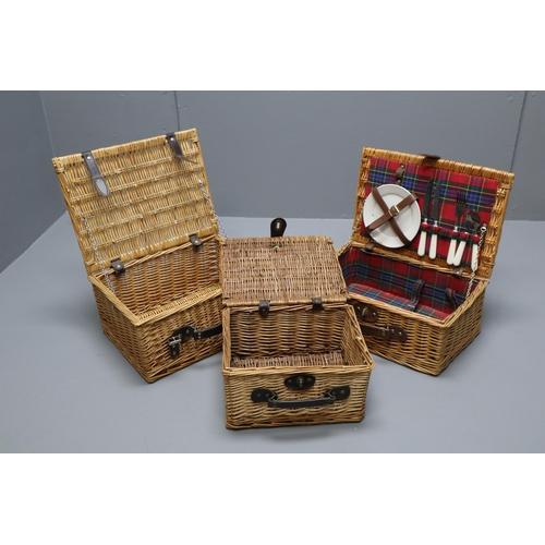 694 - Three Rattan Storage Baskets with one Containing Cutlery