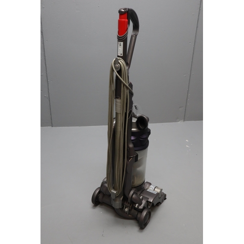 700 - A Dyson DC14 Vacuum Cleaner, With Attachments. Powers On When Tested