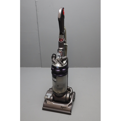 700 - A Dyson DC14 Vacuum Cleaner, With Attachments. Powers On When Tested