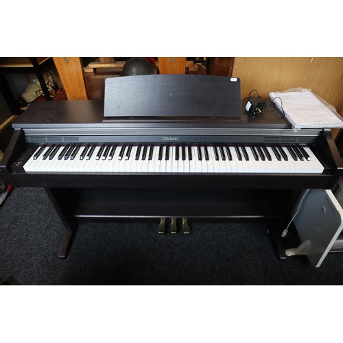 702 - Casio Celviano AP-200 full size electric piano (powers on and works when tested) with manuals