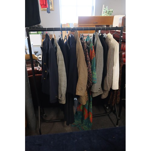 650 - Rail of Mixed Quality Clothing to include Two Mens Suit, Ladies jackets, Ladies, Dresses and more (r... 