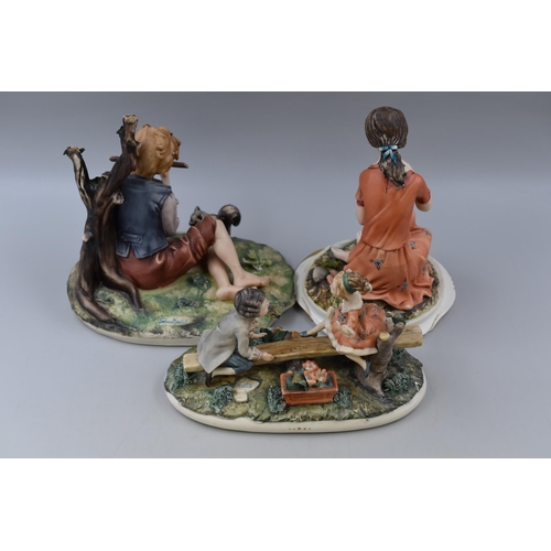 336 - Three Pieces of Capodimonte To Include Girl With Flower, See-Saw, And Boy With Flute. Tallest Approx... 