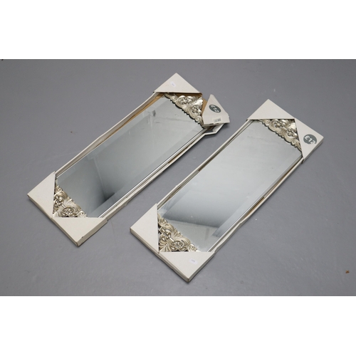 502 - Two Dunelm wall beveled mirrors in silver frame with moulded end caps (26x8) brand new boxed RRP &po... 