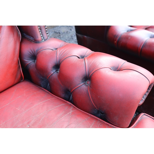 665 - Vintage Buttoned Rolled Arm Two Seater Leather Chesterfield in Oxblood on Castors a/f approx 50