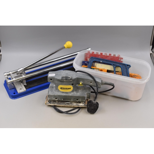 746 - Cougar Electric Sander, with a Manual Tile Cutter and a Selection of Tiling Accessories