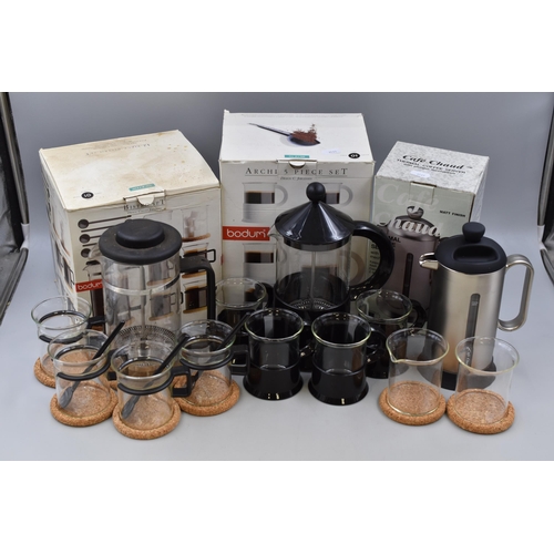 913 - A Bodum Archi 5 Piece Coffee Set, With Bodum Bistro Set (One Scoop Missing), And Boxed Cafetiere