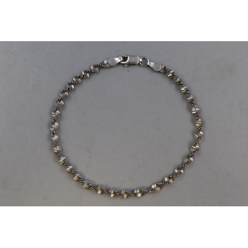 76 - A 925. Silver Spiral Chain Bracelet