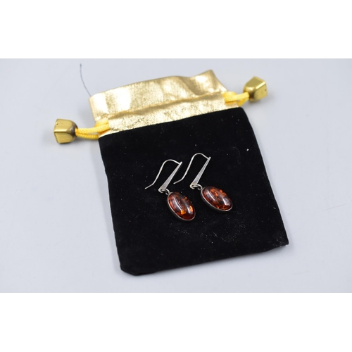 88 - A Pair of 925. Silver Amber Stoned Earrings