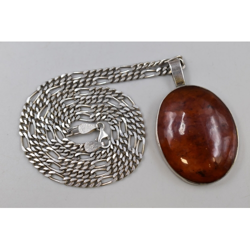 102 - A Large Oval Amber Pendant, On 925. Silver Metric Figaro Necklace Chain