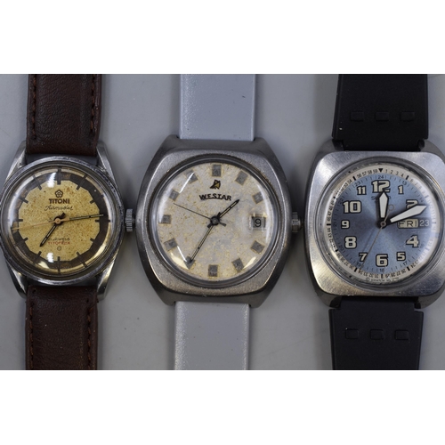 108 - Three Watches To Include Swatch Automatic 25 Jewels, Westar 25 Jewels Automatic, And Titoni 21 Jewel... 