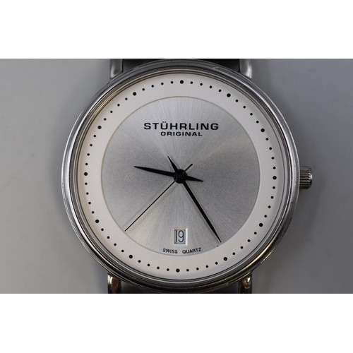 109 - A Gent's Silver Tone Stuhrling Original Day/Time Quartz Watch, Working