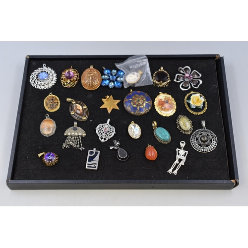 128 - A Selection of Approx 25 Vintage Designer Pendants To Include Scarab, Skeleton, And More