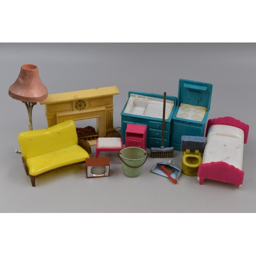 514 - A Selection of Retro Plastic Doll's House Furniture