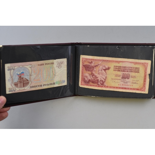 158 - Folder Containing Approx 20 Foreign Banknotes