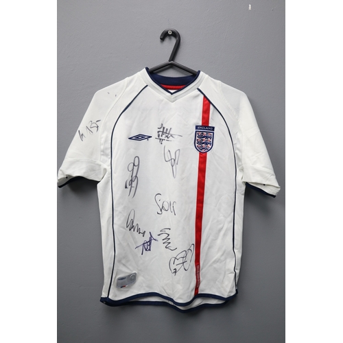 559 - Three Signed Football Shirts to include Liverpool and England Tops (unknown Signatures)