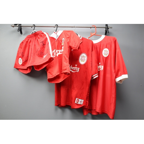 560 - Three Liverpool Football Club Items to Include Two Tops and a Signed Toddlers Top and Shorts (unknow... 