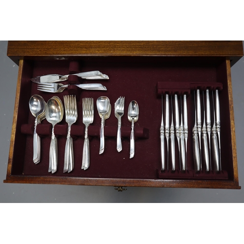 592 - One Hundred and Fourty Two Piece Community Canteen Of Cutlery Set in Teak Storage Cabinet