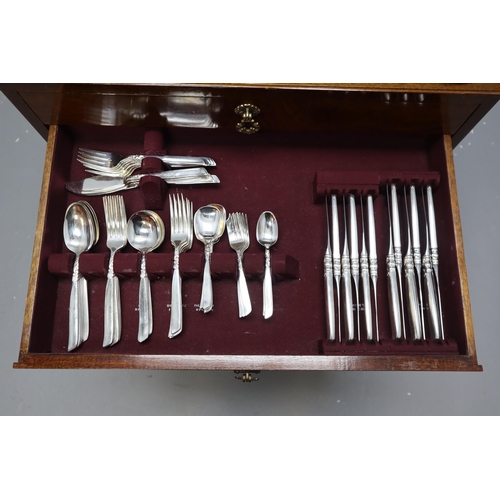 592 - One Hundred and Fourty Two Piece Community Canteen Of Cutlery Set in Teak Storage Cabinet