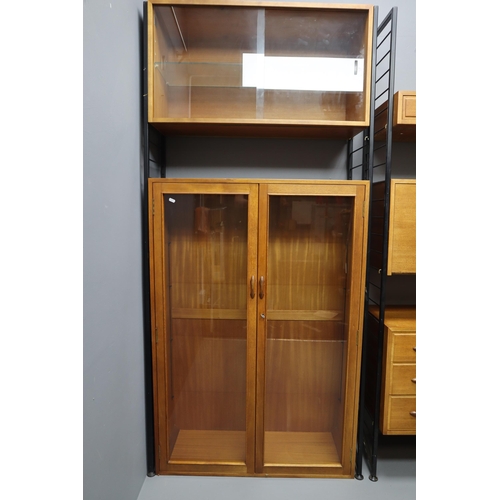 589 - Two mid century light wood ladder rax modular units, large two door cabinet with glass shelves and d... 