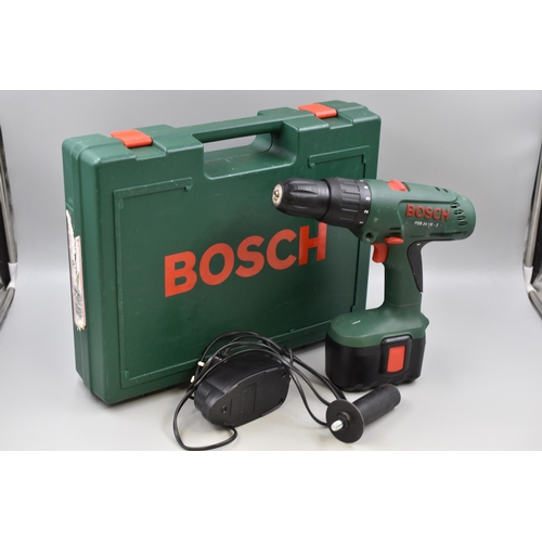 686 - A Cased Bosch PSB 24 VE-2 Hammer Drill, Powers On. Includes Charger