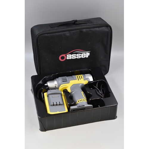 688 - Oasser air pump/compressor drill with battery and charger in case