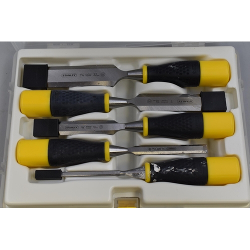 696 - Set of five Stanley chisels and a set of six other chisels