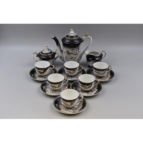 904 - A Fifteen Piece Japanese Geisha Girl Tea Set, With Oriental Dragon Decoration. One Cup is Chipped