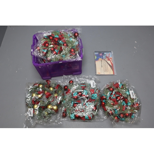 960 - A Selection of Six New Christmas Wreaths, And Various Packs of Three Christmas Aprons