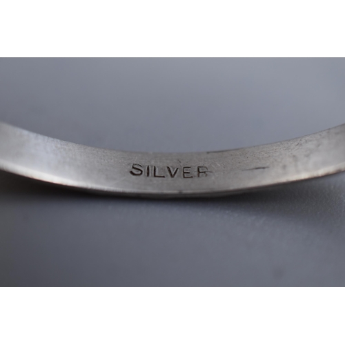 12 - A Silver Child's Adjustable Bangle