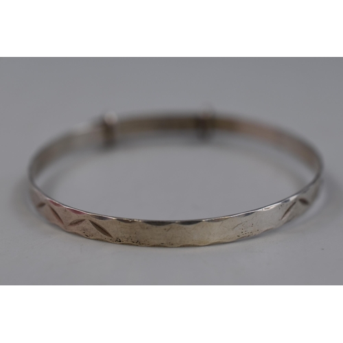 12 - A Silver Child's Adjustable Bangle