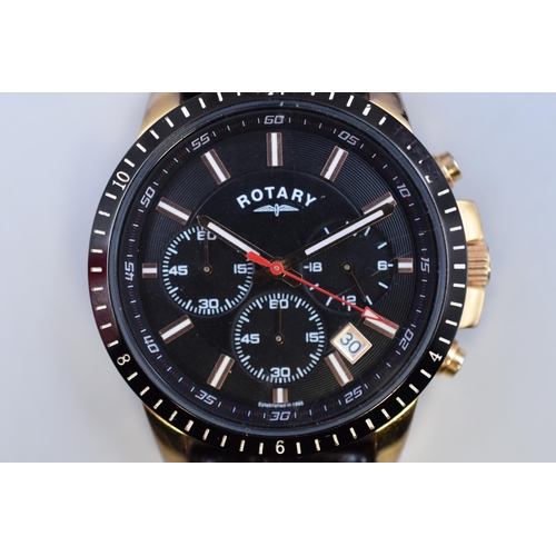 102 - A Rotary Chronograph Gent's Watch in Black, Gold Tone, And Copper Tone. With Leather Strap, Working