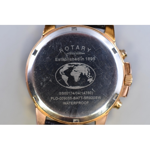 102 - A Rotary Chronograph Gent's Watch in Black, Gold Tone, And Copper Tone. With Leather Strap, Working