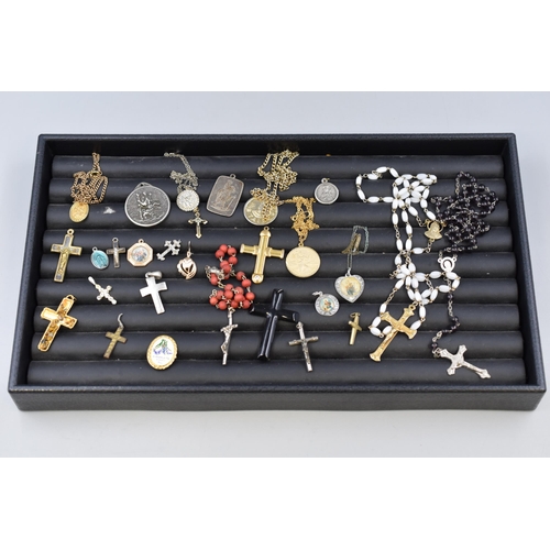 122 - A Selection of Religious Jewellery To Include Crosses, St Christopher, And More