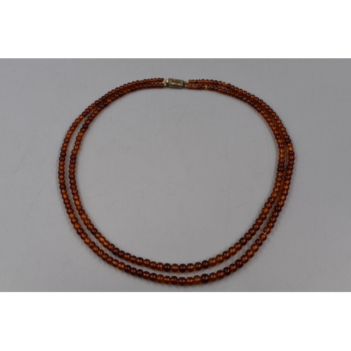 135 - Two Strand Amber beaded String Necklace (22