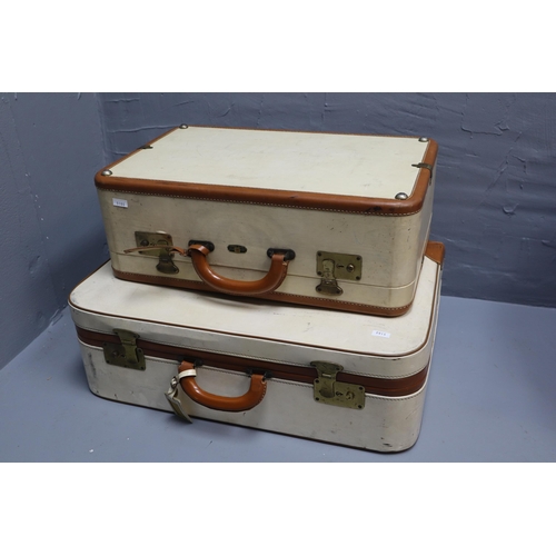 709 - Two Victor cases made in England (largest 24