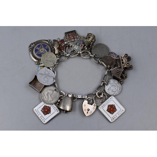 19 - Silver Charm Bracelet with Padlock Clasp and a Selection of Mostly Silver Charms