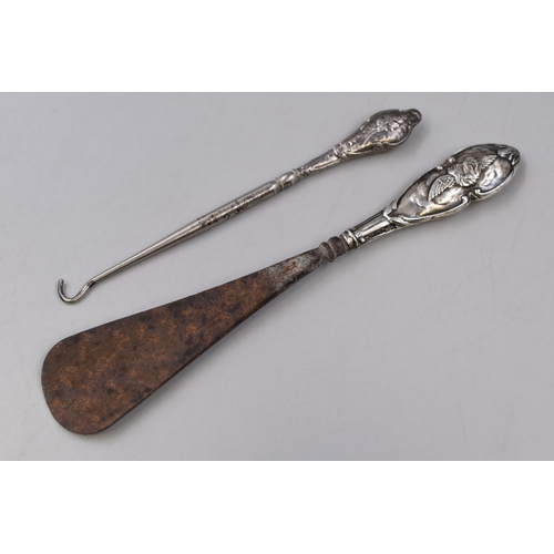 31 - A Hallmarked Birmingham Silver Handled Shoe Horn, and Hallmarked Chester Silver Handled Button Hook.... 