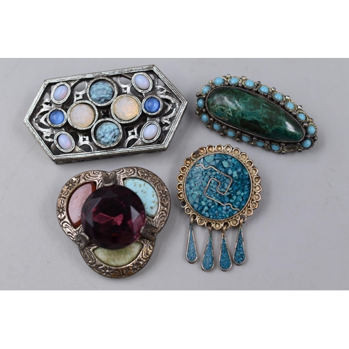 249 - Four Brooches to include Silver and Miracle. One a/f, see images