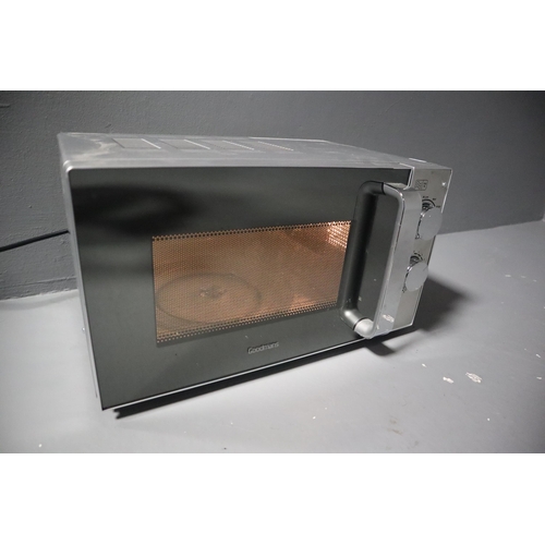 521 - Goodmans Microwave Oven Model Number 348268 Powers on when tested