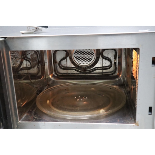 522 - A Stainless Steel 25l Combination Mirowave (MC2514), With Magnetic Timer. Microwave Powers On When T... 