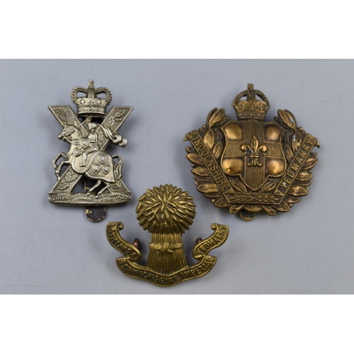 276 - Three Military Badges including Lothians and Berwickshire Imperial Yeomans, Lincolnshire Yeomanry, a... 