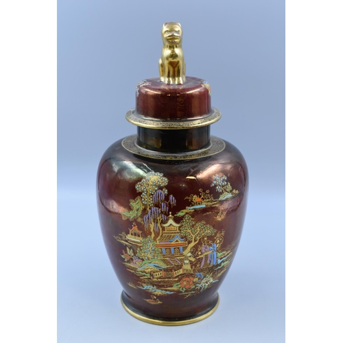 290 - A large Crown Devon ginger jar and cover, the lid mounted with a gilded Dog of Fo, enamelled with ch... 