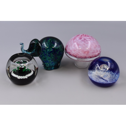 303 - Four Glass Paperweights To Include Caithness Christmas Mistletoe 1978, Selkirk Glass Atlantis, And T... 