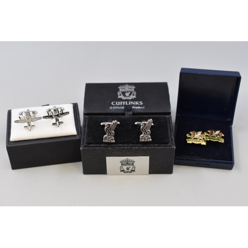 128 - Three Pairs of Gent's Cufflinks To Include Liverpool FC, Airplanes, And Dragon