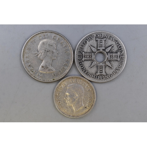 141 - Three Foreign Silver Coins