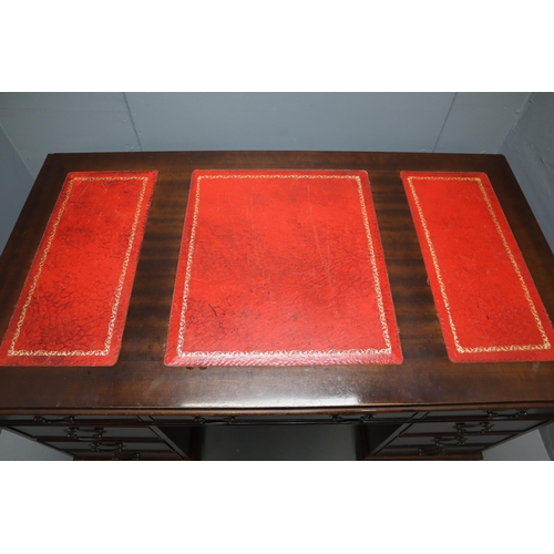 595 - Vintage  Leather Inlaid Mahogany Captain Desk with 8 Drawers Approx 54