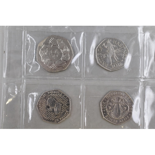 147 - Selection of 8 Collectors 50p Coins including Battle of Hastings, Sherlock Holmes, Peter Rabbit and ... 