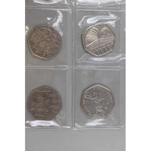 147 - Selection of 8 Collectors 50p Coins including Battle of Hastings, Sherlock Holmes, Peter Rabbit and ... 